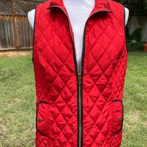 Red vest, black trim, gold accents